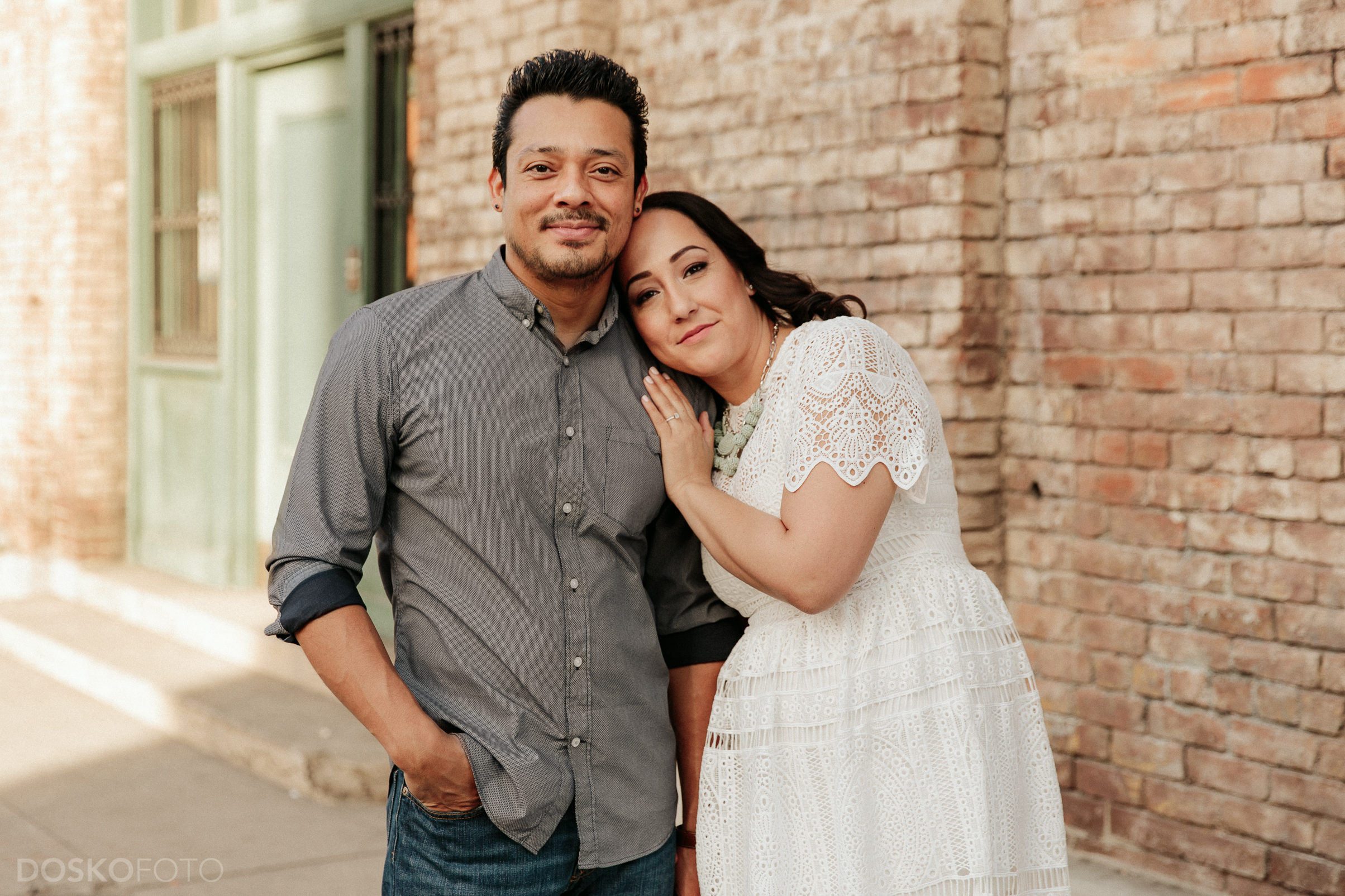 Amanda Doskocil (DOSKOFOTO), a Long Beach Wedding Photographer, travels downtown with Luis and Suzanne for an urban Los Angeles engagement photoshoot at the Nate Starkman &amp; Son building.